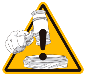 Handle hammering a gavel in front of yellow triangle